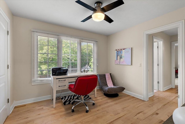 4608 Old Grand River Trl NE, Ada, MI 49301 - home office featuring light wood-style floors and a ceiling fan
