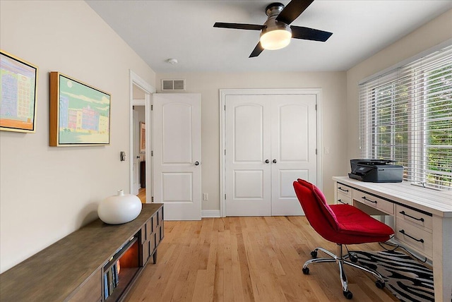 4608 Old Grand River Trl NE, Ada, MI 49301 - office with ceiling fan, light wood-type flooring, and healthy amount of natural light