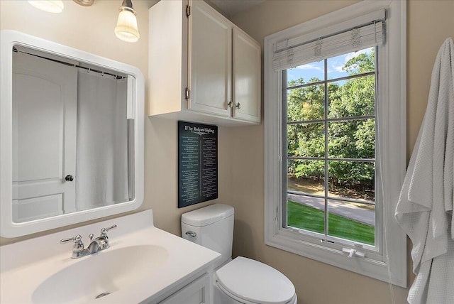 4608 Old Grand River Trl NE, Ada, MI 49301 - full bathroom with toilet and vanity