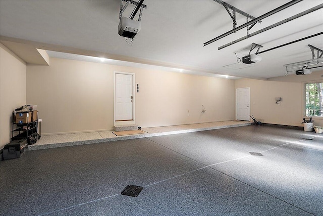 4608 Old Grand River Trl NE, Ada, MI 49301 - garage with a garage door opener