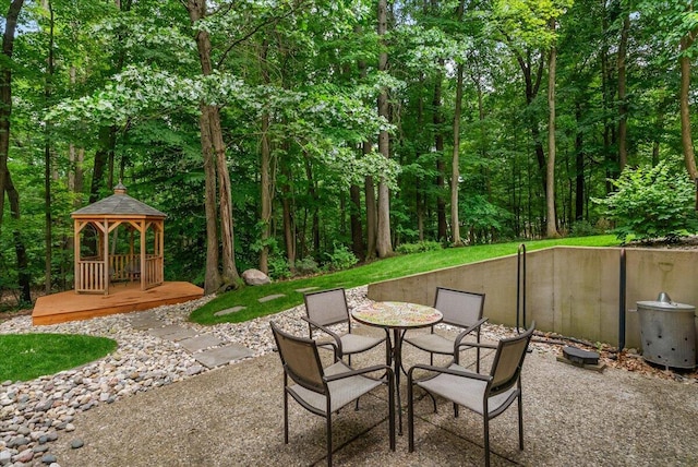 4608 Old Grand River Trl NE, Ada, MI 49301 - view of patio / terrace featuring a gazebo and outdoor dining space