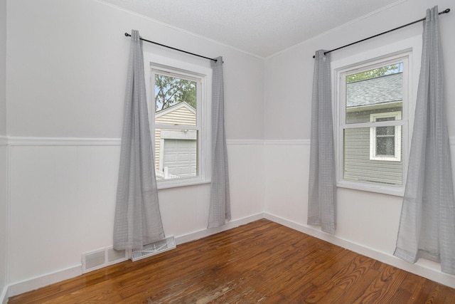 3415 Hoover St, Kalamazoo, MI 49008 - empty room with wood finished floors and crown molding