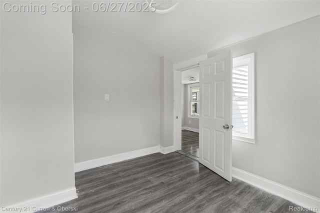19349 Negaunee, Redford, MI 48240 - spare room with dark wood-style floors and lofted ceiling