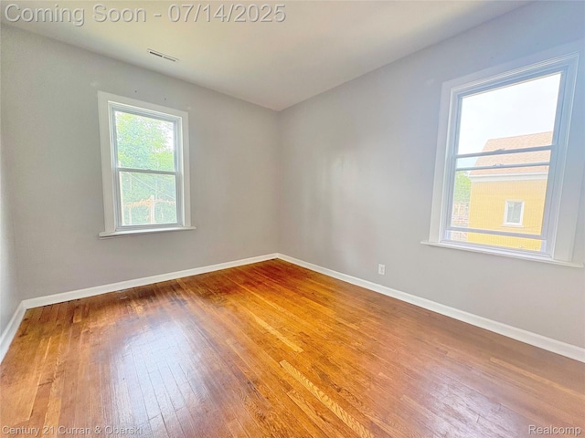 2135 Lakewood, Detroit, MI 48215 - spare room featuring wood-type flooring and baseboards