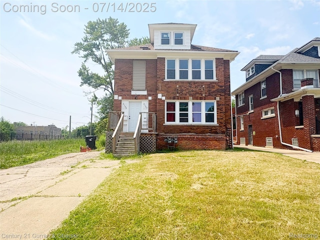 2135 Lakewood, Detroit, MI 48215 - view of front of property featuring brick siding and a front lawn