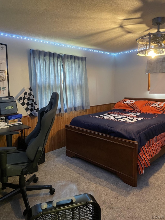 9981 W Mulberry Rd, Morenci, MI 49256 - bedroom with carpet flooring, wooden walls, wainscoting, and a textured ceiling