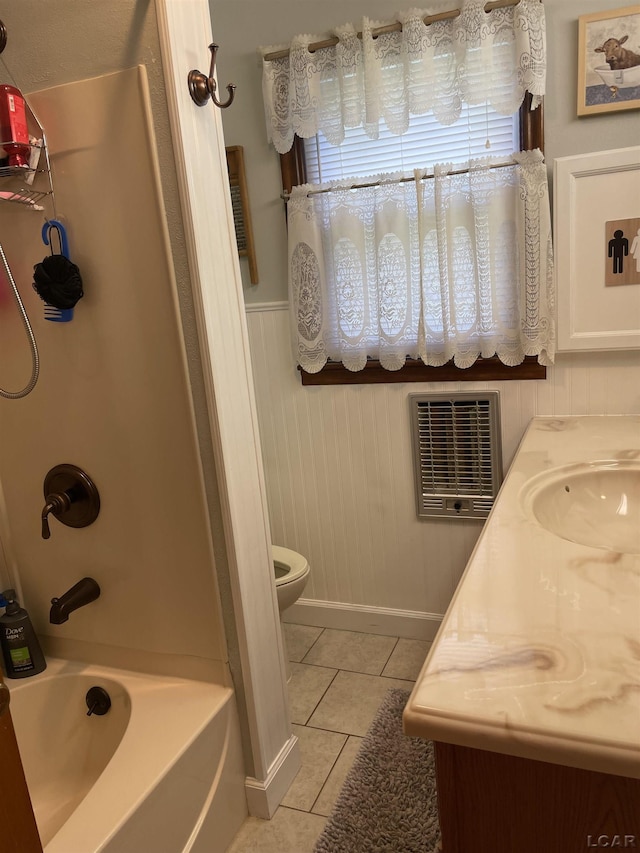 9981 W Mulberry Rd, Morenci, MI 49256 - bathroom featuring tile patterned floors, washtub / shower combination, and wainscoting