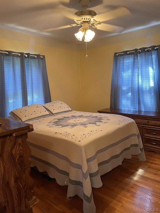 9981 W Mulberry Rd, Morenci, MI 49256 - bedroom featuring wood finished floors and a ceiling fan