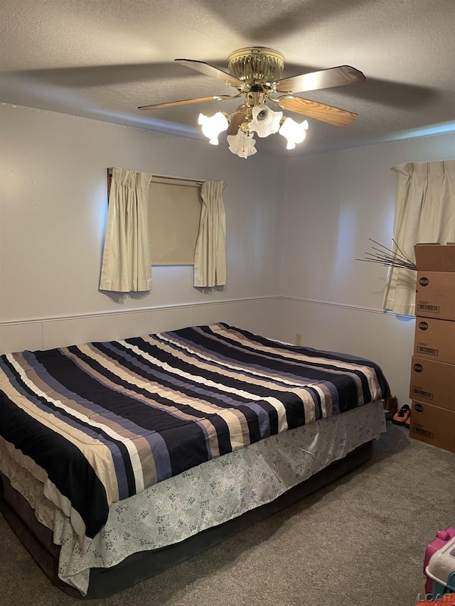 9981 W Mulberry Rd, Morenci, MI 49256 - carpeted bedroom featuring a textured ceiling and a ceiling fan