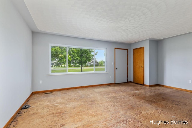 7970 Burlingame Ave SW, Byron Center, MI 49315 - spare room with baseboards