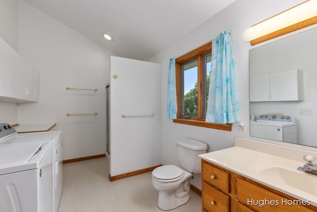 7970 Burlingame Ave SW, Byron Center, MI 49315 - full bathroom featuring washer and dryer, vanity, a stall shower, and recessed lighting