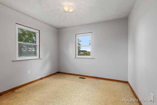 7970 Burlingame Ave SW, Byron Center, MI 49315 - unfurnished room with baseboards