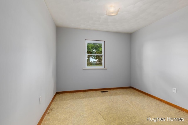 7970 Burlingame Ave SW, Byron Center, MI 49315 - unfurnished room featuring baseboards