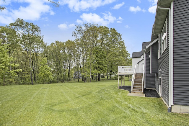 10924 Mystic Heights Trl, Michigan, MI 49071 - view of grassy yard featuring stairway and a wooden deck