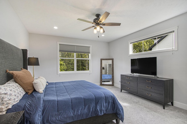 10924 Mystic Heights Trl, Michigan, MI 49071 - bedroom featuring multiple windows, light colored carpet, a ceiling fan, and recessed lighting