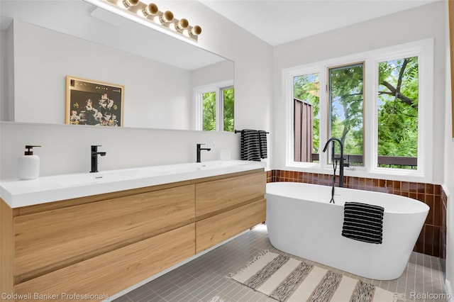 30715 River Crossing St, Bingham Farms, MI 48025 - bathroom featuring plenty of natural light, a freestanding bath, and double vanity