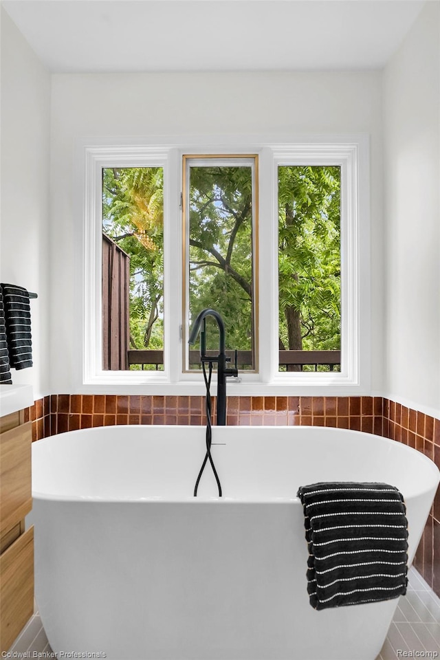 30715 River Crossing St, Bingham Farms, MI 48025 - bathroom featuring a freestanding bath and vanity
