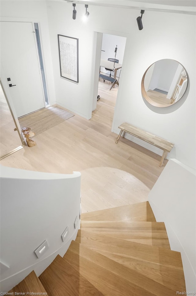 30715 River Crossing St, Bingham Farms, MI 48025 - staircase featuring wood finished floors