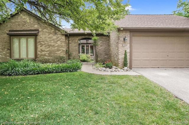30715 River Crossing St, Bingham Farms, MI 48025 - view of front of house with brick siding, a front lawn, and driveway