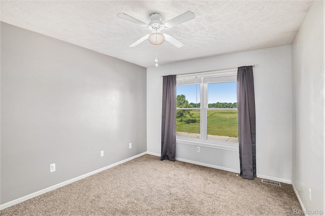 11632 Glen Mary Dr, Byron, MI 48418 - unfurnished room featuring a textured ceiling, carpet flooring, and a ceiling fan