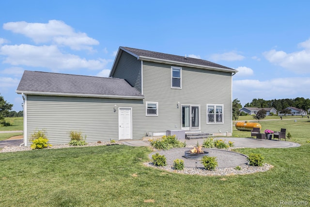 11632 Glen Mary Dr, Byron, MI 48418 - rear view of house featuring a patio, a yard, a fire pit, and oil tank