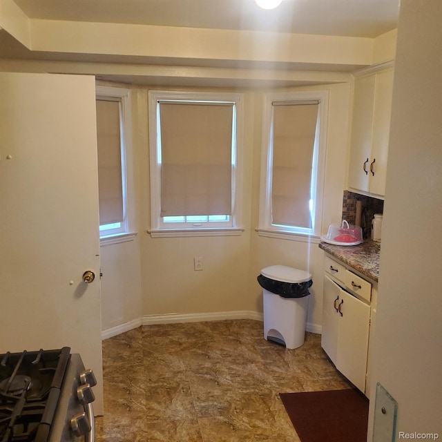 18918 Hartwell, Detroit, MI 48235 - kitchen with stainless steel gas range oven and white cabinets