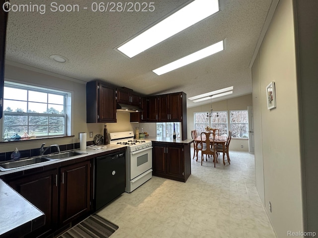 2652 Murphy Lake Rd, Silverwood, MI 48760 - kitchen with white gas stove, dishwasher, light floors, under cabinet range hood, and lofted ceiling