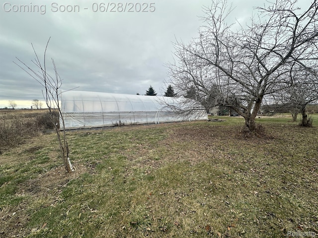 2652 Murphy Lake Rd, Silverwood, MI 48760 - view of yard with an exterior structure and an outbuilding