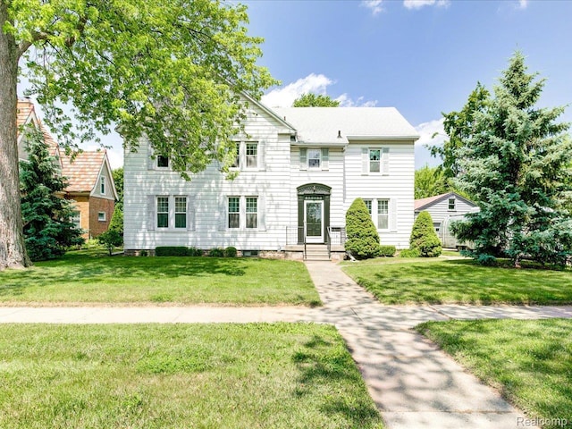 2815 Military St, Fort Gratiot, MI 48060 - view of front facade featuring a front lawn