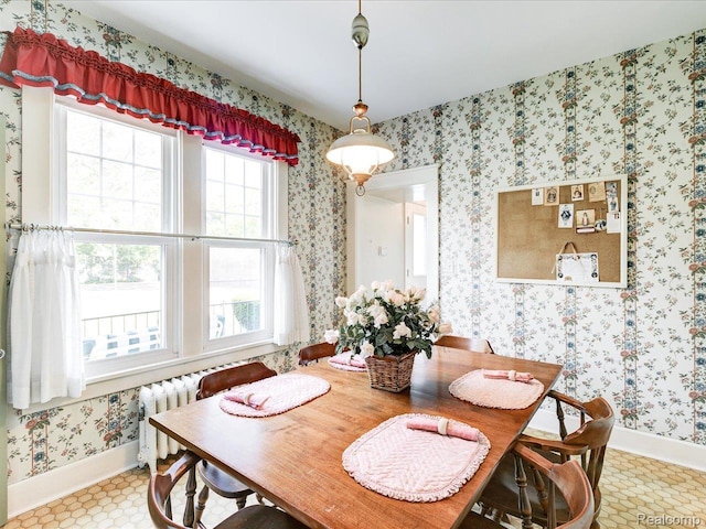 2815 Military St, Fort Gratiot, MI 48060 - dining space with wallpapered walls and radiator