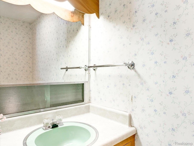 2815 Military St, Fort Gratiot, MI 48060 - bathroom with vanity and wallpapered walls