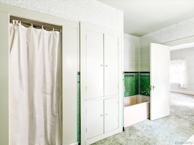 2815 Military St, Fort Gratiot, MI 48060 - unfurnished bedroom featuring carpet and wallpapered walls