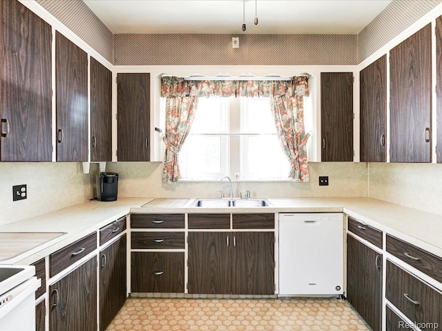 2815 Military St, Fort Gratiot, MI 48060 - kitchen featuring dishwasher, dark brown cabinetry, range, and light countertops