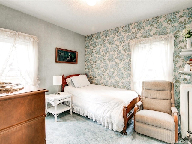 2815 Military St, Fort Gratiot, MI 48060 - bedroom featuring carpet flooring, wallpapered walls, and radiator