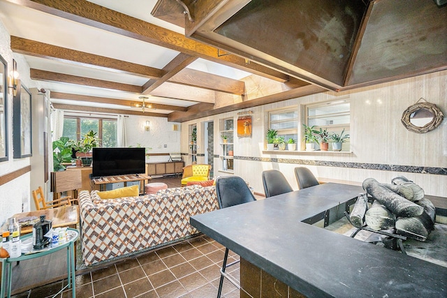 835 Farrell Ave, Kalamazoo, MI 49006 - living area with dark tile patterned floors and coffered ceiling