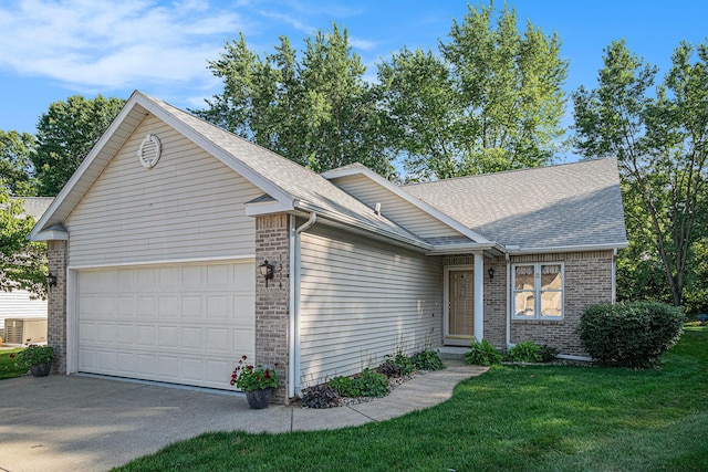 1314 Honeysuckle Ln, Niles, MI 49120 - ranch-style home featuring brick siding, a garage, roof with shingles, and concrete driveway