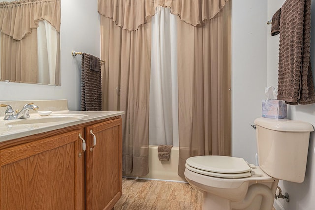 1314 Honeysuckle Ln, Niles, MI 49120 - full bathroom featuring vanity, shower / tub combo with curtain, and wood finished floors