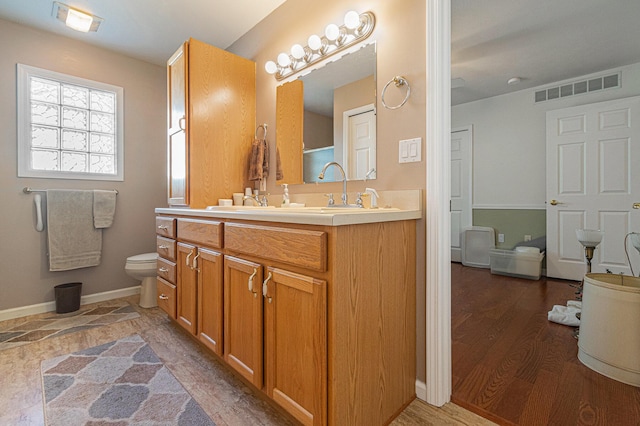 1314 Honeysuckle Ln, Niles, MI 49120 - bathroom with vanity and wood finished floors