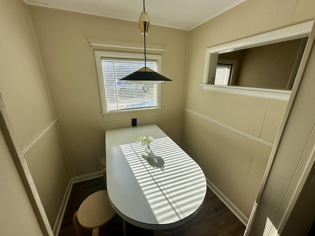 1805 Lakeshore Dr, Saint Joseph, MI 49085 - dining area with wood finished floors and ornamental molding