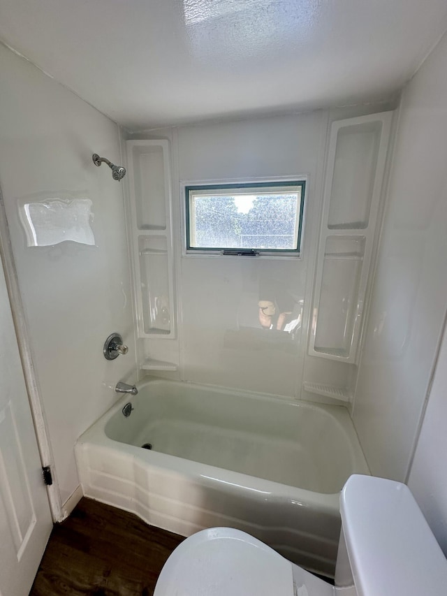 1805 Lakeshore Dr, Saint Joseph, MI 49085 - bathroom with bathtub / shower combination and wood finished floors