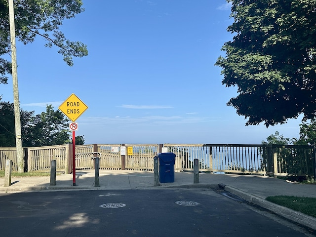 1805 Lakeshore Dr, Saint Joseph, MI 49085 - view of street featuring traffic signs, sidewalks, curbs, and a water view