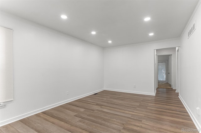 1085 Pennsylvania Ave, Lincoln Park, MI 48146 - spare room featuring recessed lighting, wood finished floors, and crown molding
