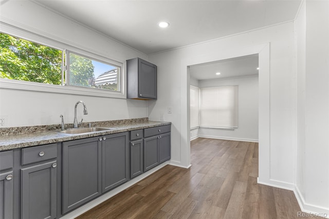1085 Pennsylvania Ave, Lincoln Park, MI 48146 - kitchen featuring gray cabinets, dark wood-style floors, and recessed lighting
