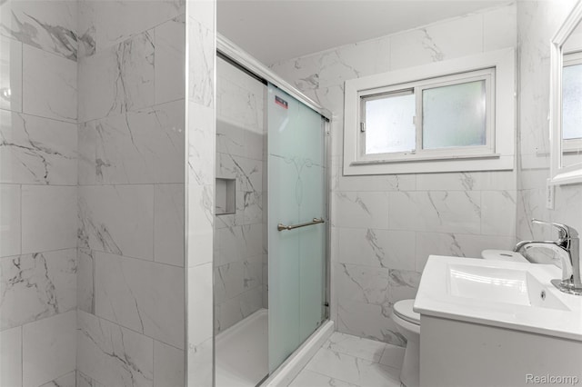 1085 Pennsylvania Ave, Lincoln Park, MI 48146 - bathroom with marble look tile flooring, a stall shower, plenty of natural light, and tile walls