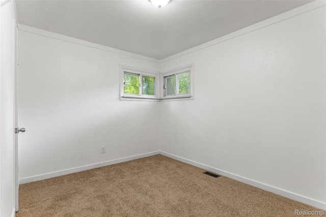 1085 Pennsylvania Ave, Lincoln Park, MI 48146 - unfurnished room featuring carpet and ornamental molding