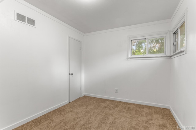1085 Pennsylvania Ave, Lincoln Park, MI 48146 - carpeted spare room with baseboards and crown molding