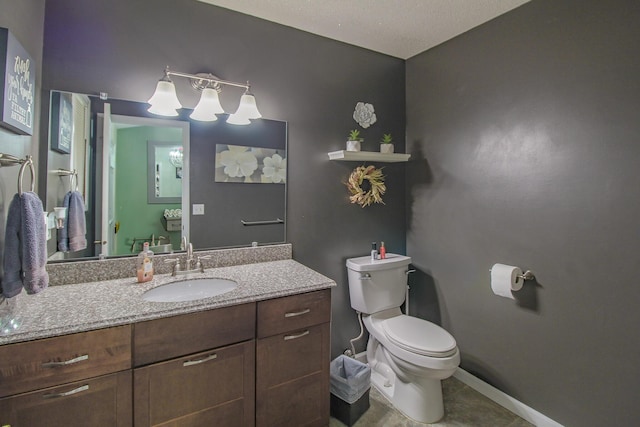 7640 W H Ave, Kalamazoo, MI 49009 - bathroom featuring toilet and vanity