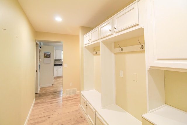 7640 W H Ave, Kalamazoo, MI 49009 - mudroom featuring light wood-style flooring and recessed lighting
