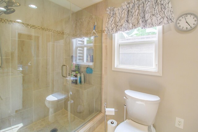 7640 W H Ave, Kalamazoo, MI 49009 - bathroom with toilet and a stall shower