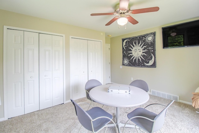 7640 W H Ave, Kalamazoo, MI 49009 - dining room featuring carpet flooring and ceiling fan